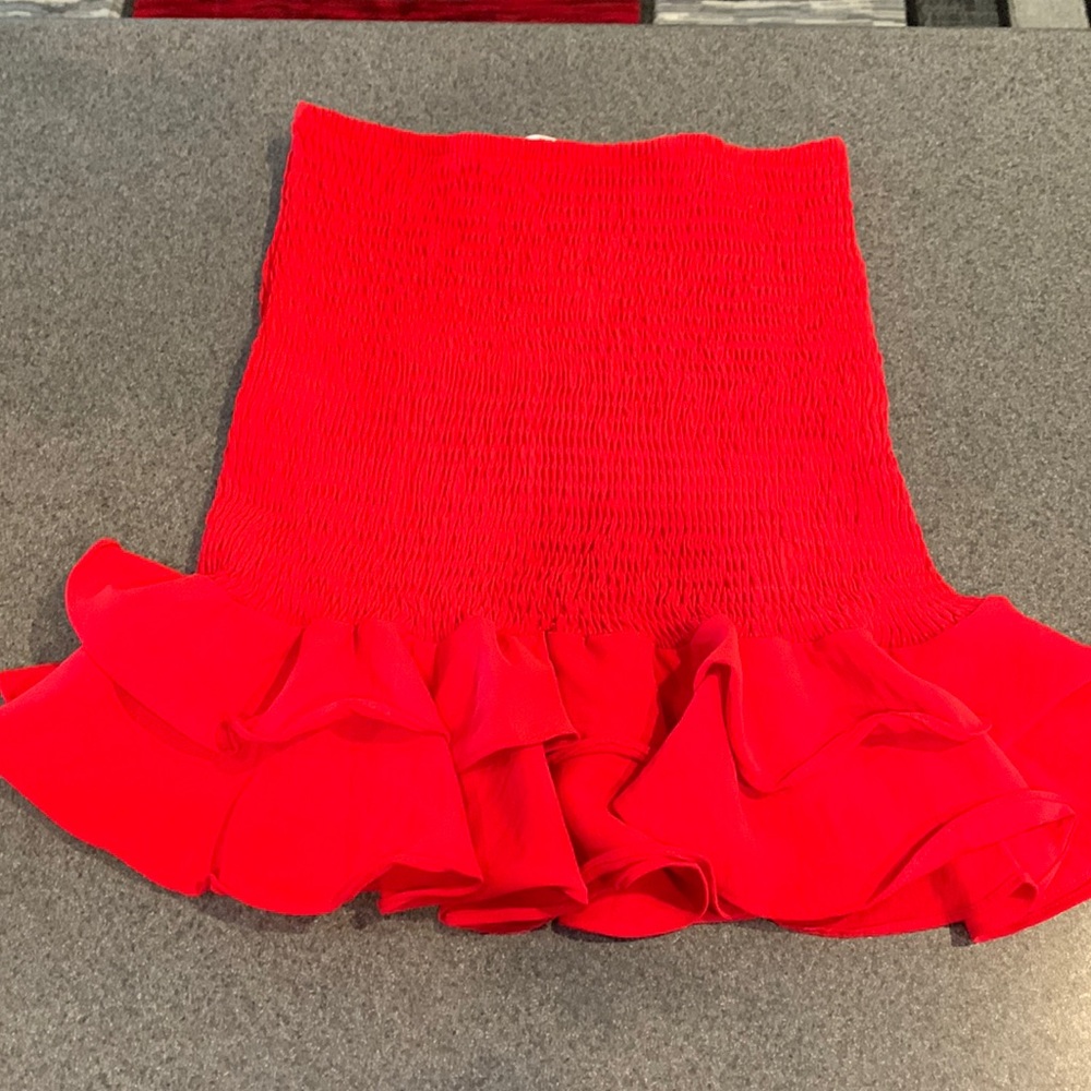 Small read flowy skirt, perfect for salsa dancing the night away